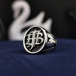 Load image into Gallery viewer, Elegant monogram ring in gold, featuring custom initials for men. Ideal as a meaningful gift, this ring suits both formal events and casual wear, adding a refined touch.