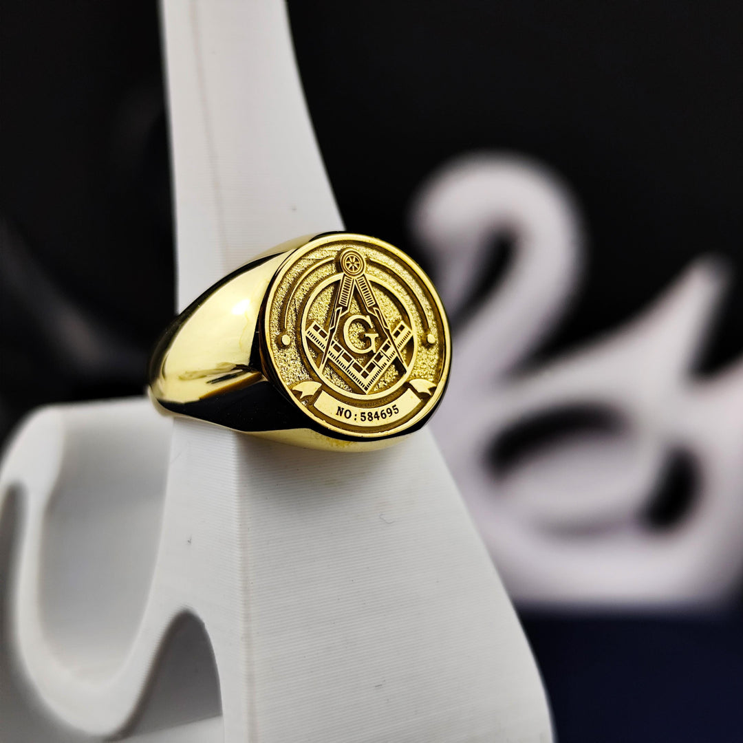 Handcrafted gold Mason ring, personalized with the traditional Masonic square and compass symbol.