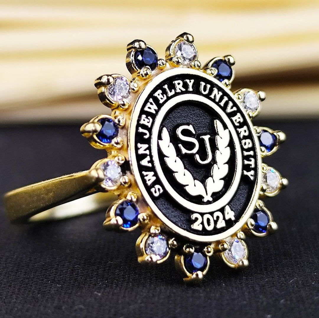Elegant women’s university ring with colorful stones, designed to celebrate graduation. This delicate piece is perfect for honoring academic achievements.