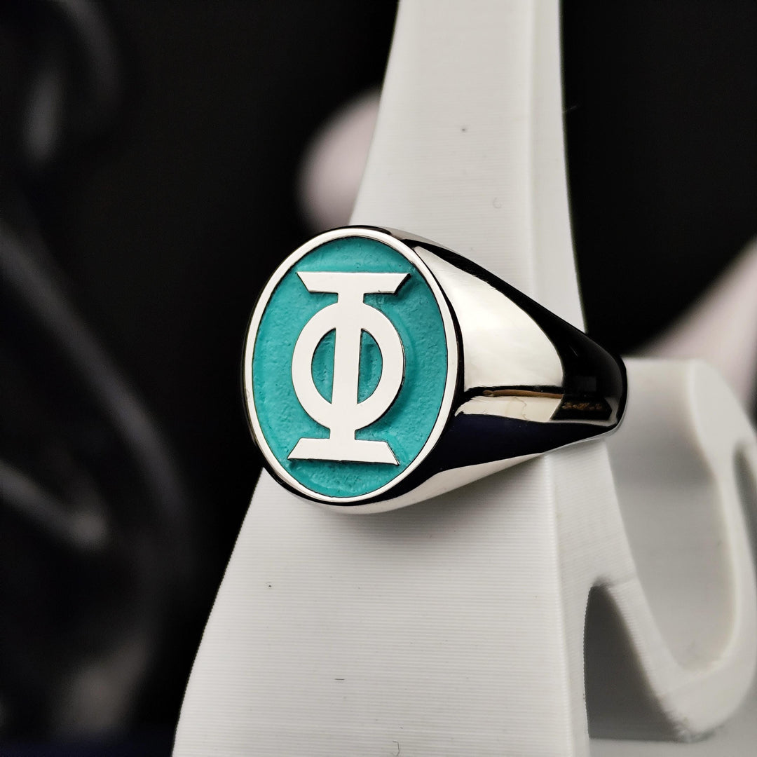 This personalized company ring is an exquisite choice for those seeking a refined, custom-made jewelry piece. Featuring an oval-shaped design and intricate engraving, it allows for business branding, monograms, or unique symbols. Made in silver or gold, this luxury signet ring is a stylish representation of prestige and professionalism.