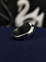 Load image into Gallery viewer, A distinguished custom family crest ring, designed in a bold shield shape with black and white stone accents. This heraldic signet is an ideal heirloom, symbolizing strength and legacy. Whether worn as a personal statement or passed down through generations, this coat of arms ring embodies the essence of tradition, history, and regal style.