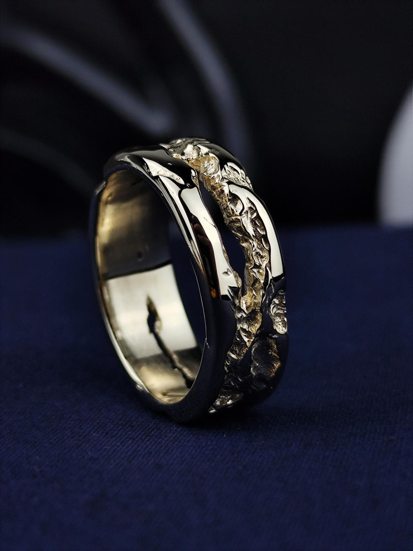 This handcrafted 14K rustic gold ring embodies the perfect balance between elegance and natural beauty. The textured gold band gives it a distinctive, organic look, making it ideal for weddings, anniversaries, or everyday wear. Designed for those who love handmade, artisanal jewelry, this timeless gold ring offers a sophisticated yet earthy aesthetic.