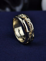 Load image into Gallery viewer, This 14K rustic gold ring is a unique and handcrafted jewelry piece featuring an organic, textured design. Made from solid gold, this band showcases a natural and vintage-inspired look, perfect for those who appreciate minimalism and artisanal craftsmanship. Whether worn as a wedding band, everyday accessory, or special keepsake, this handmade gold ring blends elegance with a raw, earthy charm.