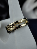 Load image into Gallery viewer, This handcrafted 14K rustic gold ring features a beautifully textured surface that gives it a one-of-a-kind organic appeal. Designed for men and women, this solid gold band is perfect as a wedding ring, everyday jewelry, or a symbolic minimalist piece. Its vintage-inspired design brings together raw elegance and contemporary simplicity for a timeless statement.