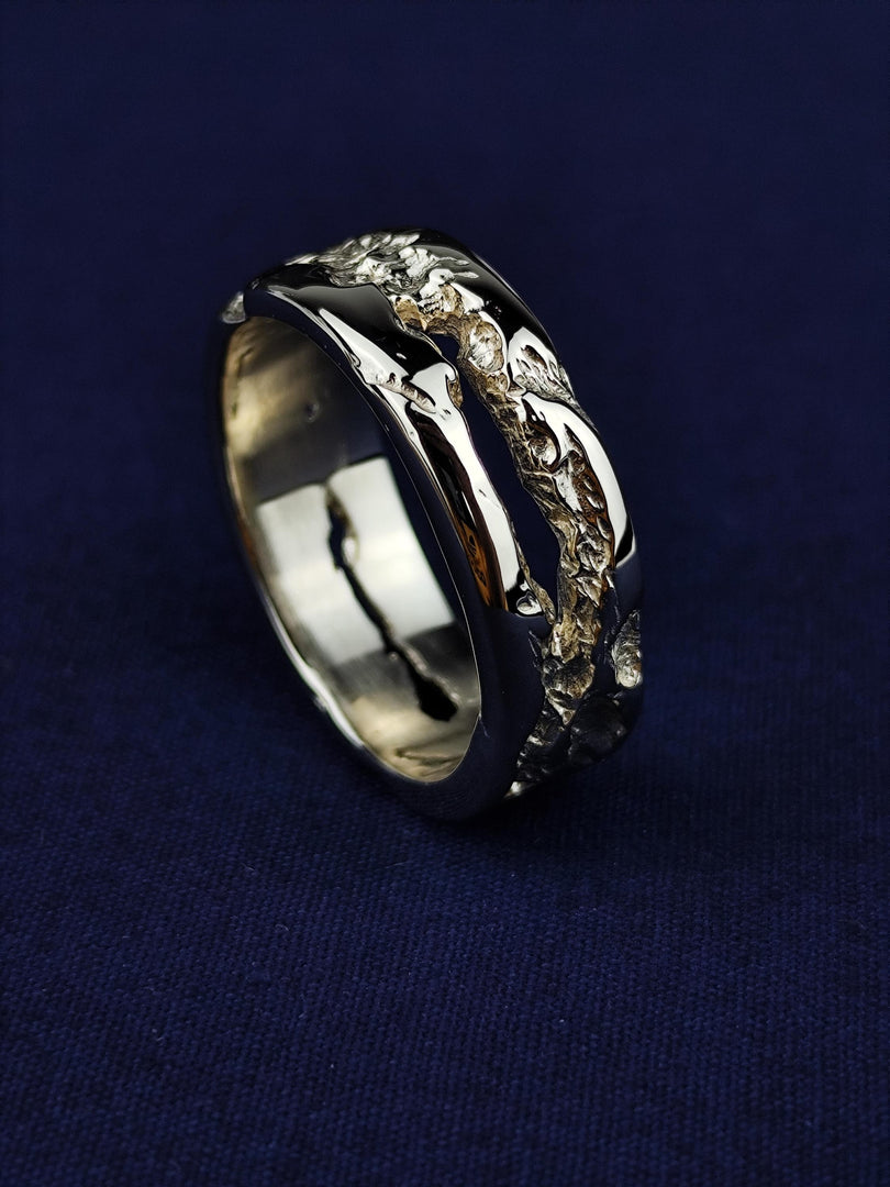 Artisan-crafted rustic ring in 14K gold, ideal as a wedding band or statement piece. This ring adds a touch of natural charm to any look.