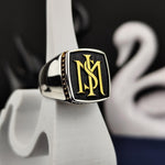 Load image into Gallery viewer, Men’s silver ring with a bold stone centerpiece, custom-engraved with two initials for a personalized touch. This elegant signet ring is perfect for daily wear or special occasions, making it a meaningful and stylish gift.