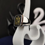 Load image into Gallery viewer, Elegant men’s silver signet ring with a stone and two initials, blending modern design with traditional craftsmanship. Perfect for those seeking meaningful, custom jewelry.