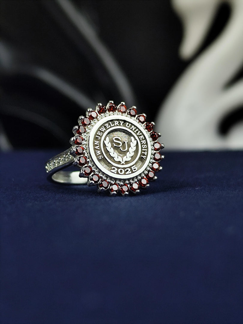 Women’s round silver university ring, designed for graduates who appreciate timeless and elegant jewelry. This piece makes a meaningful gift or keepsake, symbolizing academic achievements and personal success.