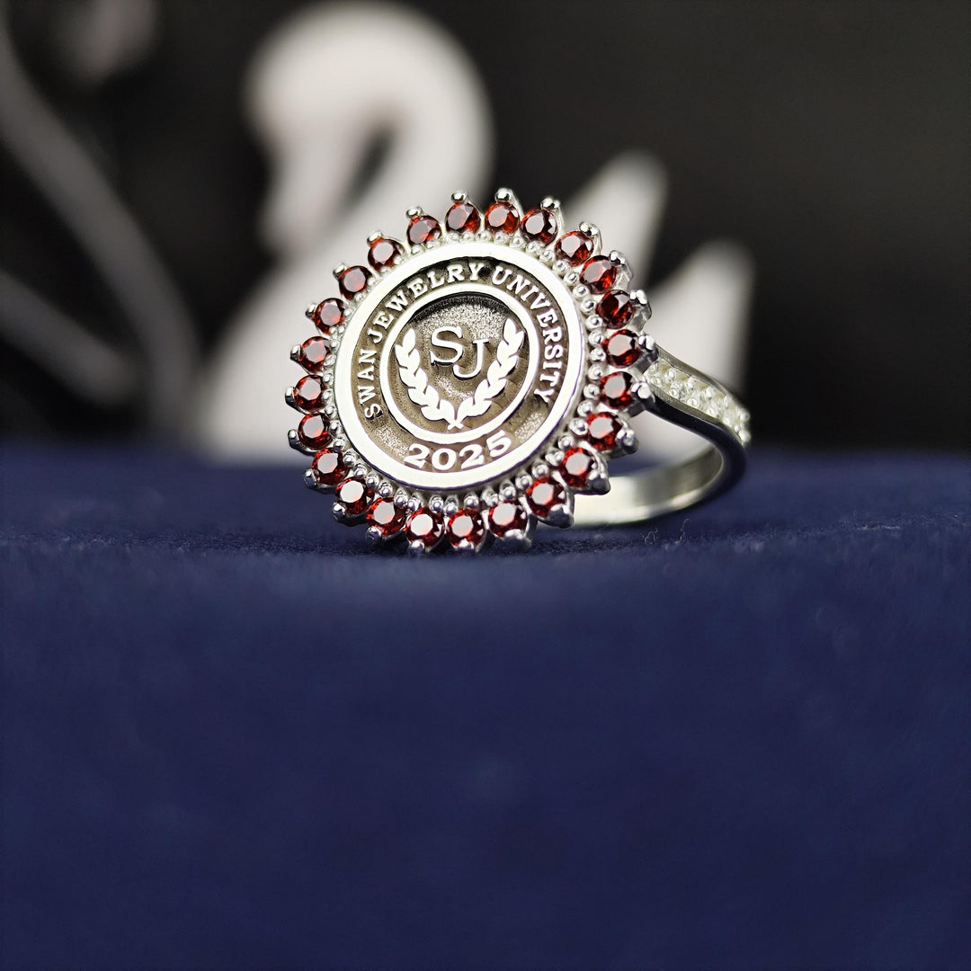 Polished women’s silver round university ring, designed for those who appreciate understated elegance. This accessory symbolizes success and academic pride, making it an ideal graduation keepsake.