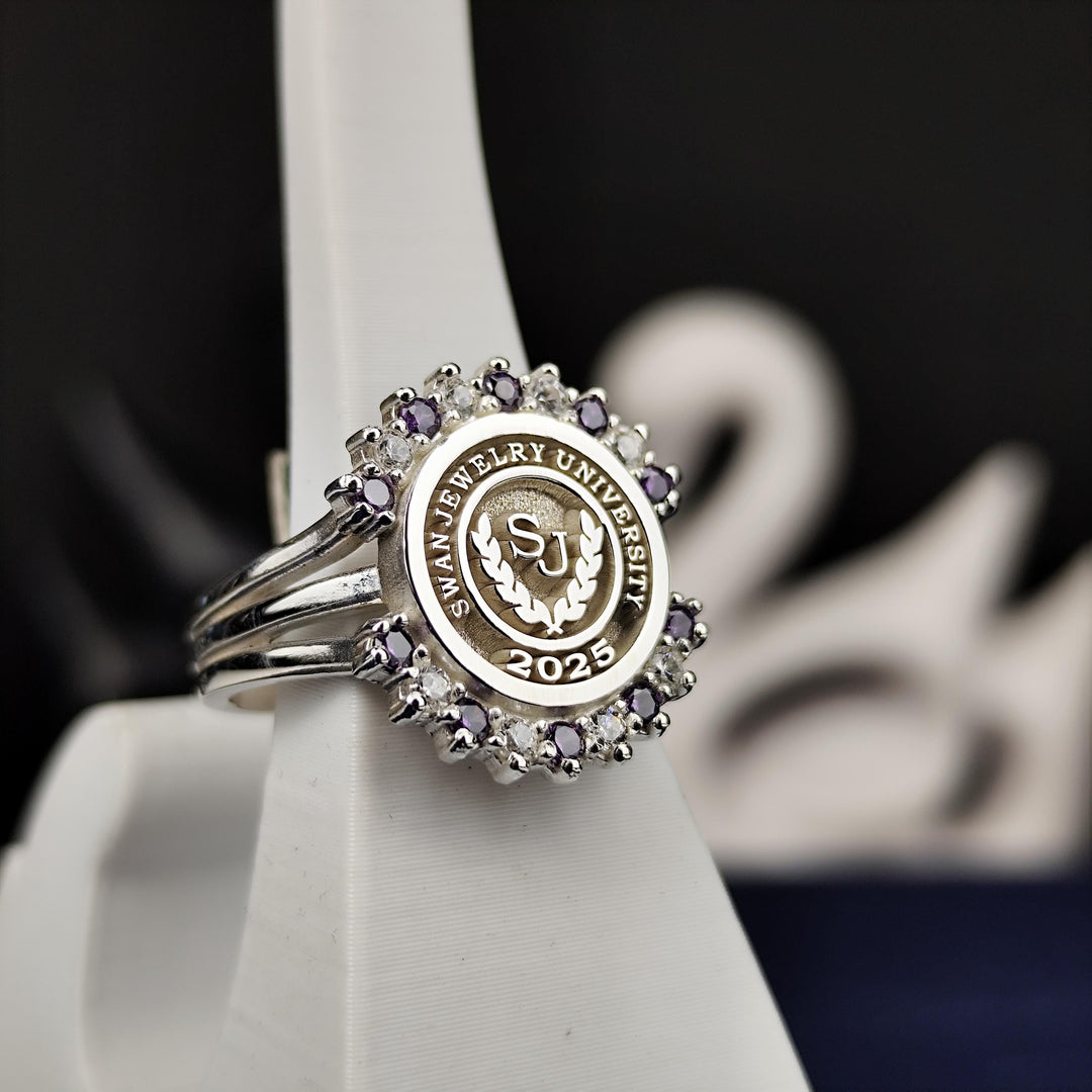 Unique university ring for women, featuring vibrant purple and white stones in a sleek design. A meaningful accessory to honor academic achievements.