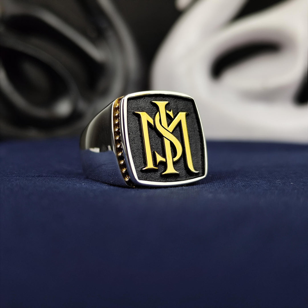 Elegant silver signet ring for men, crafted with a stone and two engraved initials. This personalized piece makes a stylish and versatile accessory for formal events or daily wear.