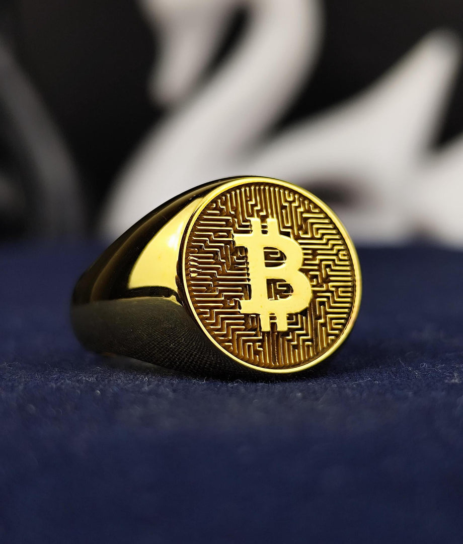 Elegant gold Bitcoin ring with a sophisticated design that represents the blockchain revolution. Perfect for crypto lovers who appreciate stylish jewelry.