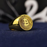 Load image into Gallery viewer, Exclusive Bitcoin signet ring crafted with a sleek gold finish, perfect for cryptocurrency enthusiasts who want to showcase their digital wealth in style. A unique blend of fashion and blockchain innovation.