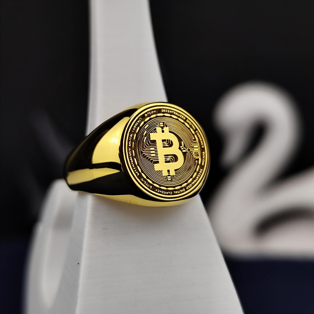 Gold-plated Bitcoin band ring, combining elegance with the digital age. A unique way to show support for cryptocurrency and blockchain advancement.