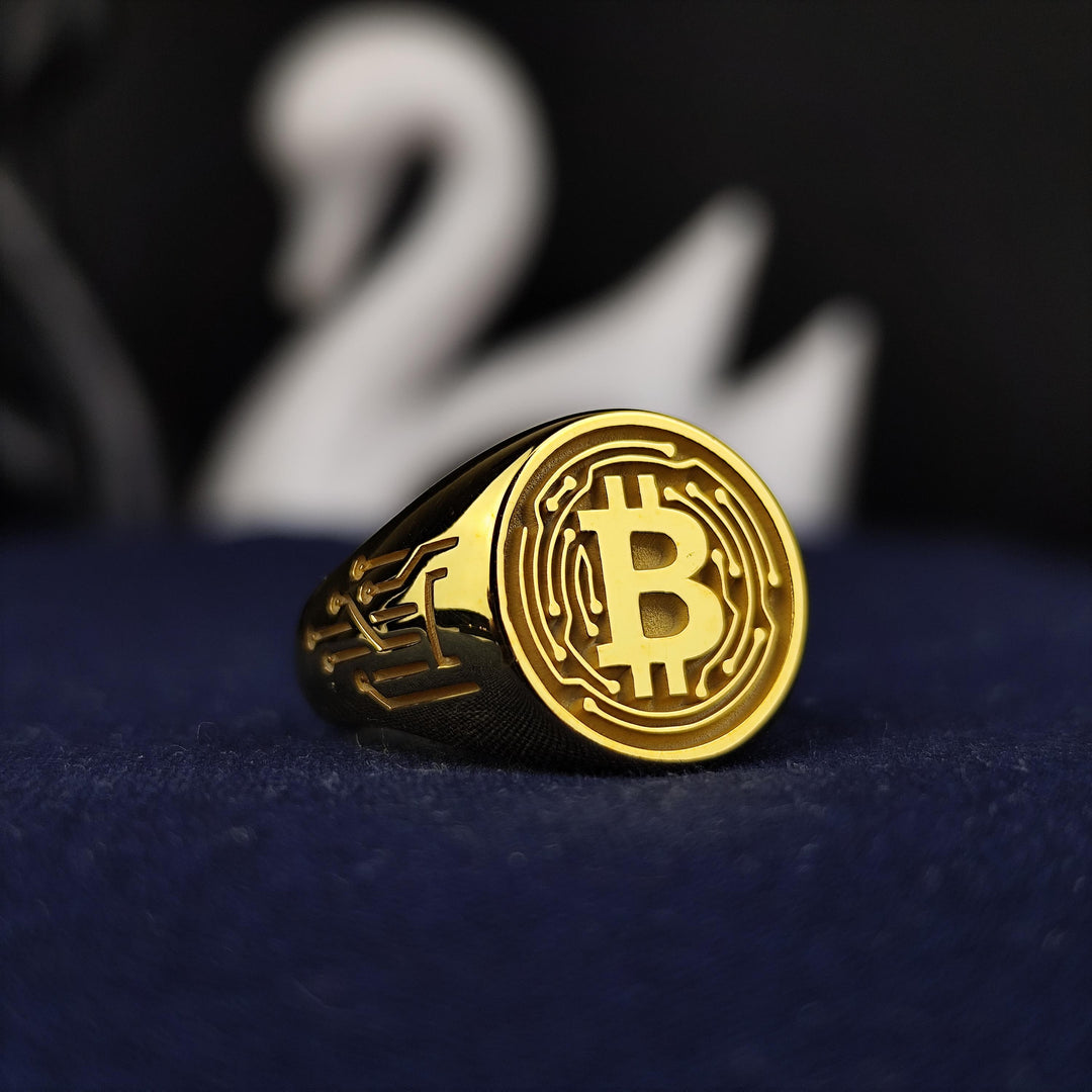 Luxury Bitcoin ring crafted in high-quality gold, featuring a sleek design that represents the future of finance and blockchain innovation. Perfect for crypto enthusiasts and investors.