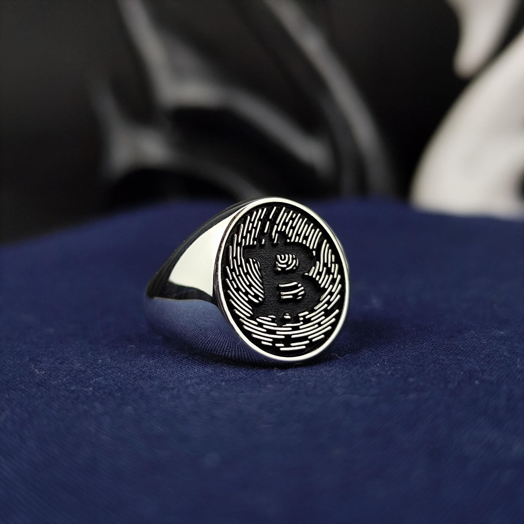 Modern silver Bitcoin signet ring, offering a luxurious gold or gold-plated finish. A unique crypto accessory for those who value digital assets.