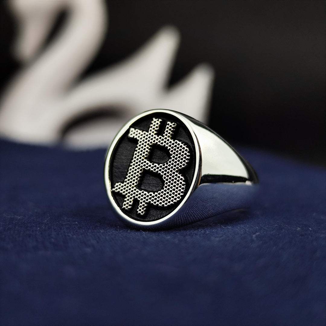 Unique silver Bitcoin ring with an engraved BTC logo, symbolizing financial freedom and digital wealth. A stylish and thoughtful gift for cryptocurrency enthusiasts.