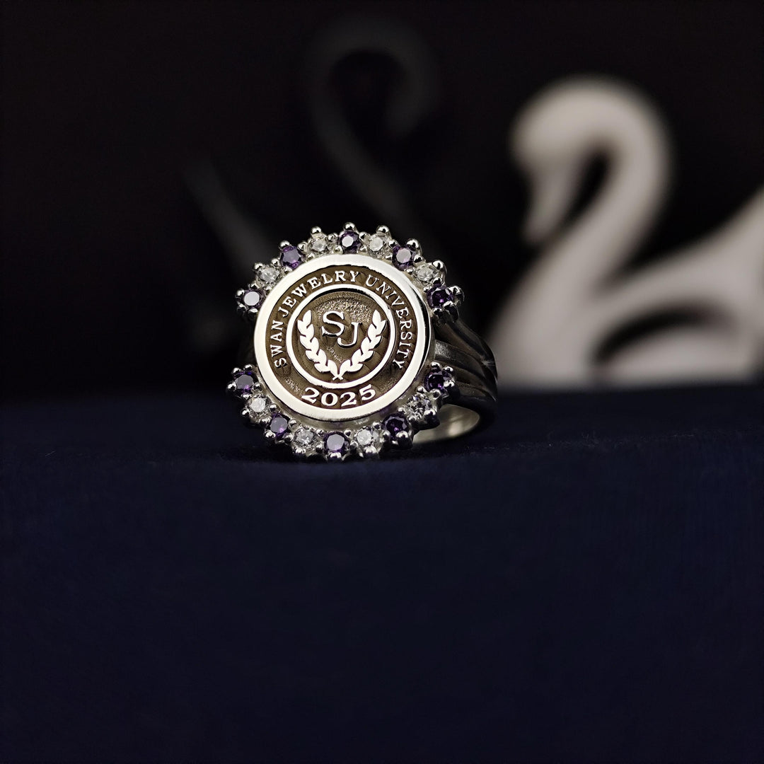 Polished women’s university ring with purple and white stones, crafted for celebrating graduation and academic pride. A versatile and elegant keepsake.