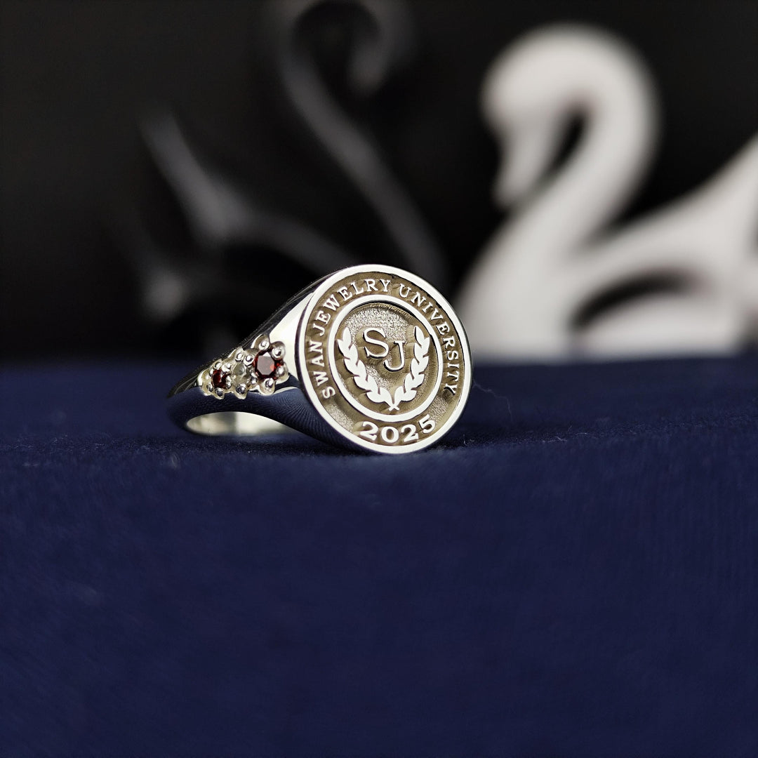 Unique women’s three-stone university ring, designed as a keepsake to honor academic pride. A meaningful accessory for proud graduates.