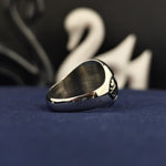 Load image into Gallery viewer, Personalized oval silver ring for women and men, designed with a custom letter engraving. A stylish and meaningful accessory for celebrating milestones.