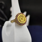 Load image into Gallery viewer, Custom women’s college ring with a bold red stone, crafted in a round gold-plated design. This elegant accessory celebrates milestones with sophistication.