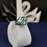 Load image into Gallery viewer, A sophisticated and sleek two-letter ring, this custom signet design features engraved initials or a surname. A timeless and versatile jewelry piece, it is ideal for men and women. Whether as a wedding keepsake, anniversary gift, or a stylish everyday ring, this unique accessory offers elegance and personal meaning.