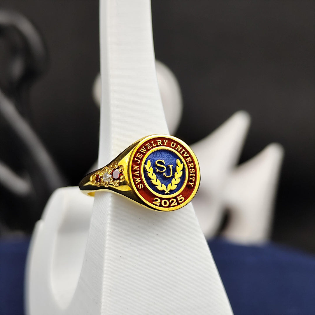 Elegant college ring for women, crafted with a sleek gold plated finish and a refined stone setting. A sophisticated and meaningful accessory.