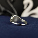 Load image into Gallery viewer, Unique angel number ring with a polished silver band and a shimmering stone, embodying balance and spiritual awareness. A timeless and sophisticated piece that complements any outfit or occasion.