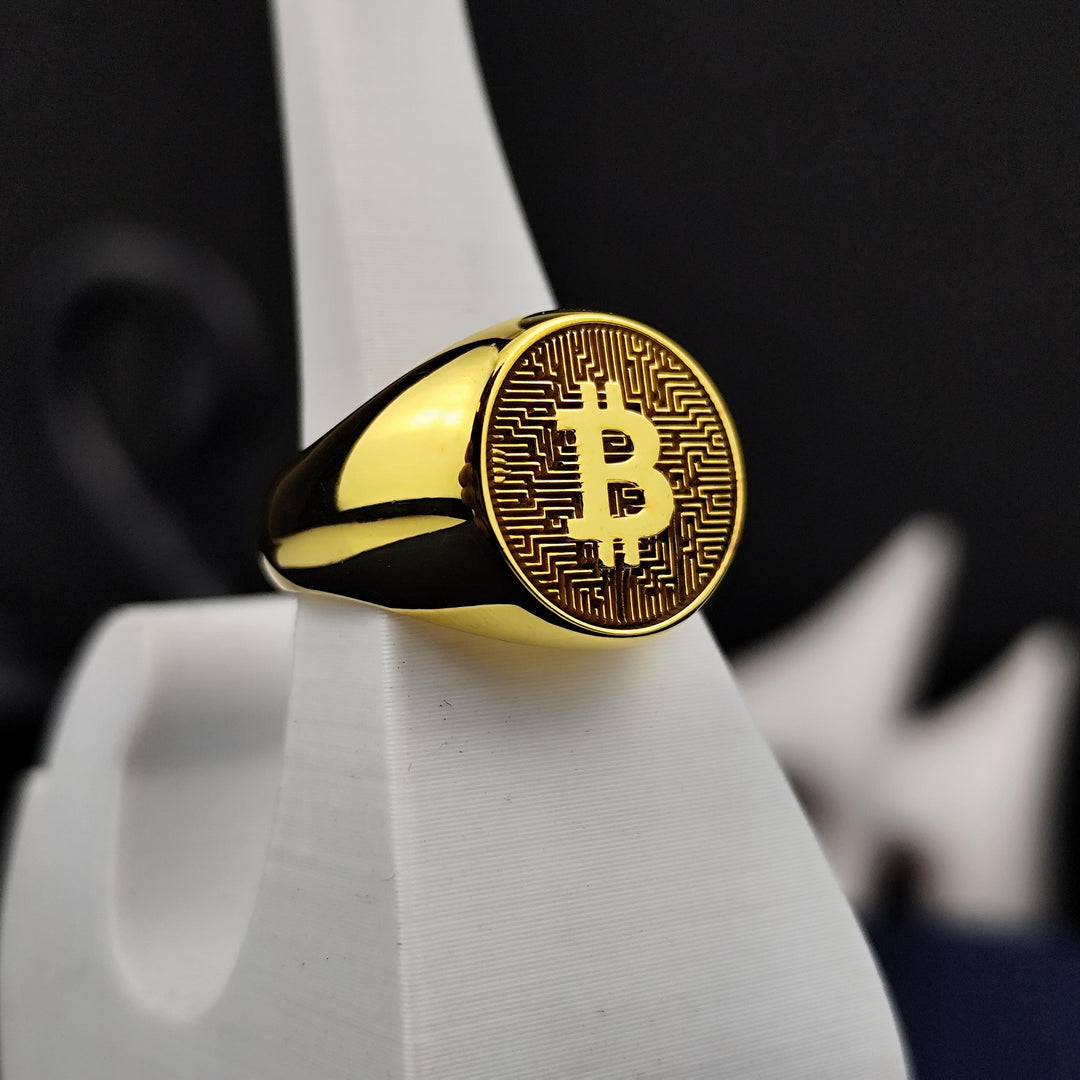 Custom-designed gold Bitcoin signet ring, blending modern elegance with a symbolic blockchain theme. A meaningful keepsake for crypto lovers.