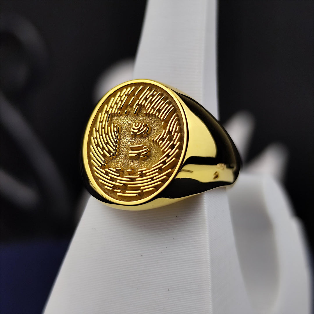 Fashion-forward Bitcoin ring in a gold-plated finish, designed to complement both casual and formal attire for crypto aficionados.