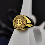 Load image into Gallery viewer, Minimalist Bitcoin fashion ring in gold, offering a unique way to represent the decentralized finance movement. A perfect crypto gift for blockchain enthusiasts.