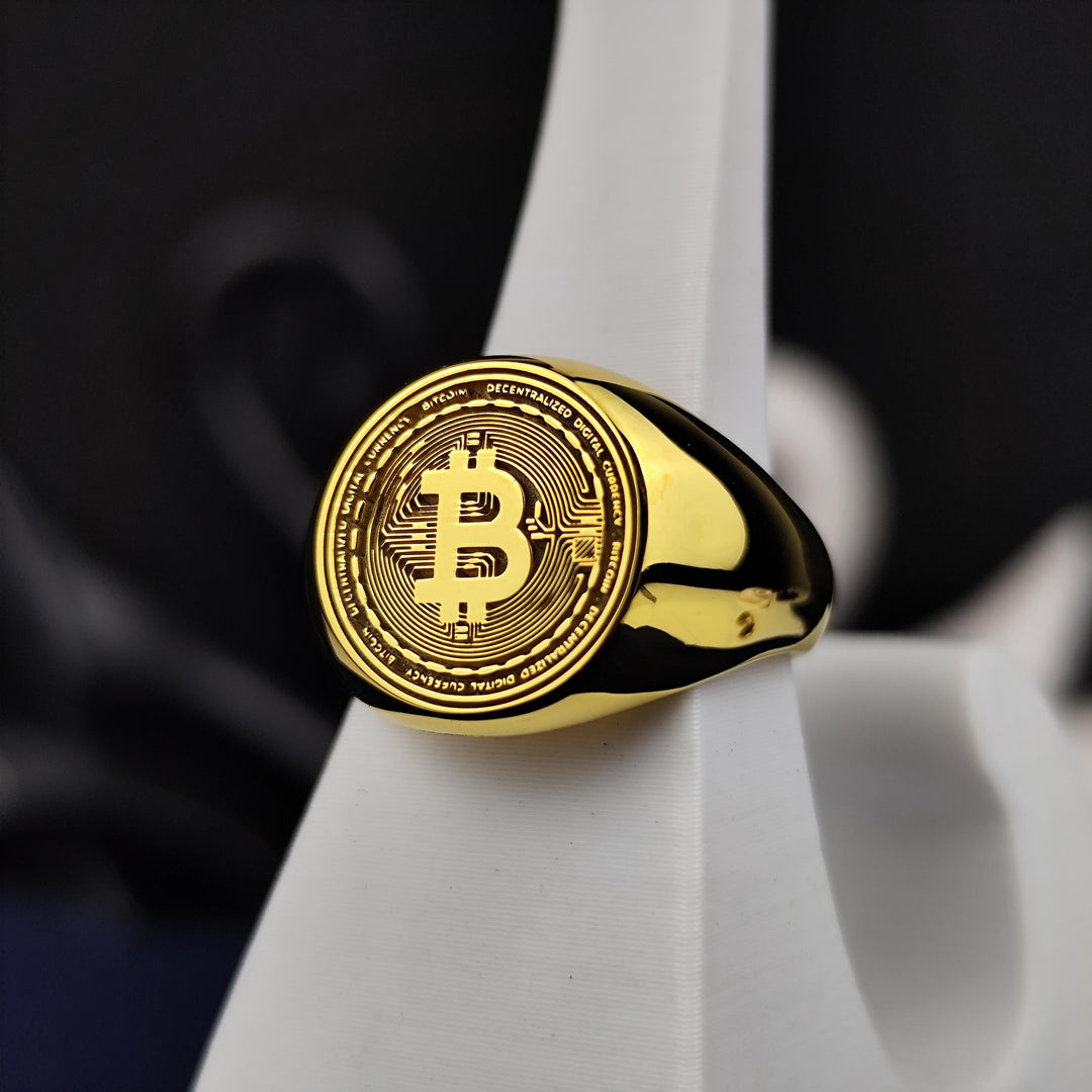 Minimalist Bitcoin fashion ring in gold, offering a unique way to represent the decentralized finance movement. A perfect crypto gift for blockchain enthusiasts.