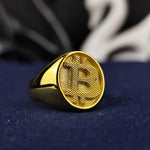 Load image into Gallery viewer, Elegant Bitcoin jewelry ring featuring a polished gold finish and a detailed BTC emblem. A unique accessory for crypto investors and blockchain supporters.