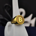 Load image into Gallery viewer, Minimalist gold Bitcoin ring, featuring a sophisticated BTC emblem. Ideal for everyday wear and a meaningful gift for cryptocurrency enthusiasts.
