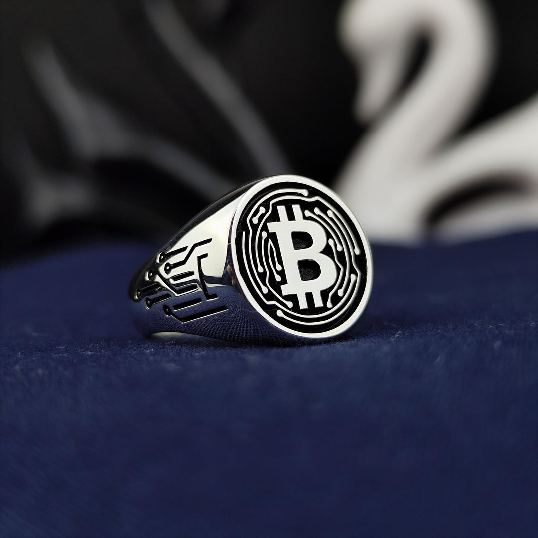 Minimalist Bitcoin jewelry crafted in sterling silver, offering a sophisticated way to express your enthusiasm for blockchain innovation and digital wealth.