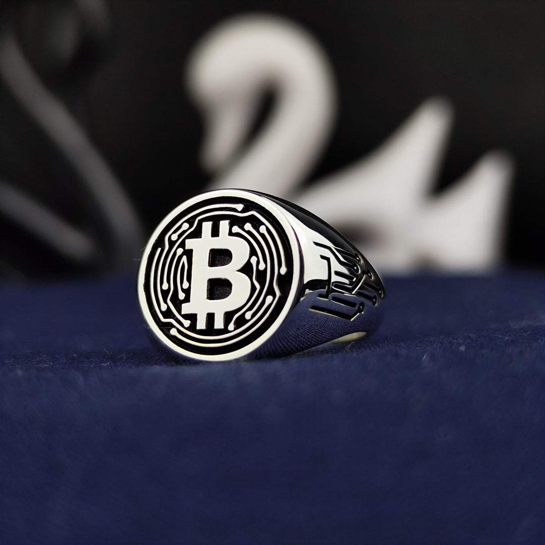 Silver-plated Bitcoin fashion ring, offering a sleek and modern design for tech-savvy individuals passionate about cryptocurrency and decentralized finance.