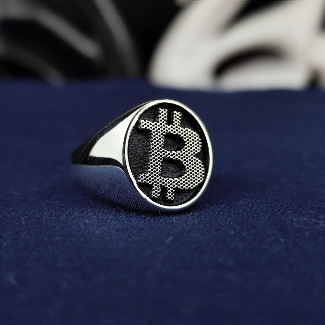 Stylish BTC signet ring in silver with gold-plated options, blending blockchain passion with timeless elegance. A meaningful piece for crypto investors.