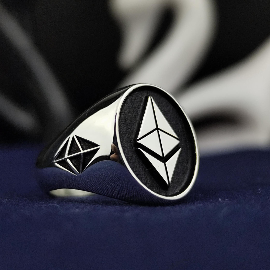 Silver Ethereum ring designed for blockchain enthusiasts and investors. Crafted with a minimalist yet bold design, this crypto-inspired jewelry piece symbolizes innovation and digital wealth, making it a perfect gift or personal statement accessory.