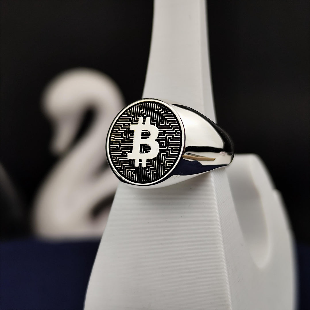 Silver Bitcoin band ring with a contemporary design, perfect for those who embrace digital innovation and blockchain technology.