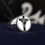 Load image into Gallery viewer, A beautifully crafted unisex Jesus and cross ring, handmade from silver for those who value faith and style. This crucifix signet band is a meaningful Christian jewelry piece, ideal for believers seeking a timeless expression of devotion. Perfect for men and women, this ring makes a thoughtful Christian gift for Easter, Christmas, or any spiritual occasion, offering a blend of elegance and religious symbolism.