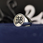 Load image into Gallery viewer, Celebrate your identity with this custom two-letter monogram ring, designed for men and women who love unique jewelry. This elegant signet ring, available in silver or gold, features engraved initials, making it a meaningful and stylish piece. Whether worn as a daily accessory or given as a gift, this personalized ring is a timeless representation of your name, initials, or special connection.