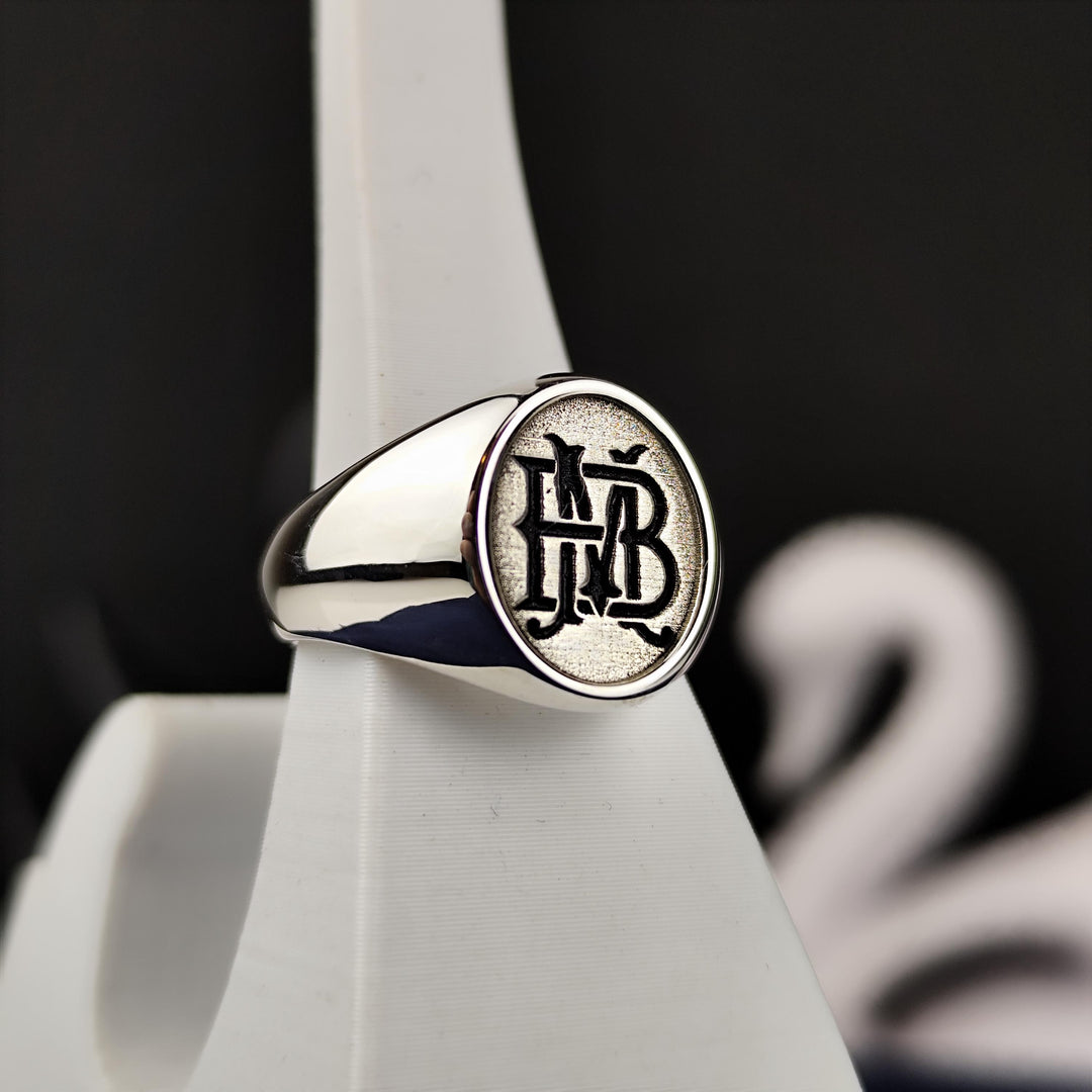 Designed for those who appreciate custom jewelry, this two-letter monogram ring is an elegant and stylish piece. Featuring engraved initials, this signet ring in silver or gold is a perfect name ring for men and women. A great way to personalize your style or gift a loved one, this handmade accessory is perfect for birthdays, anniversaries, or as a thoughtful keepsake.