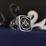 Load image into Gallery viewer, A striking Master Mason ring with a bold stone centerpiece, handcrafted for members of the Masonic fraternity. Made from high-quality silver or gold, this lodge ring symbolizes dedication and tradition. Whether worn for special occasions or daily as a reminder of Masonic values, this detailed signet ring is a meaningful accessory and a perfect gift for a devoted Freemason.
