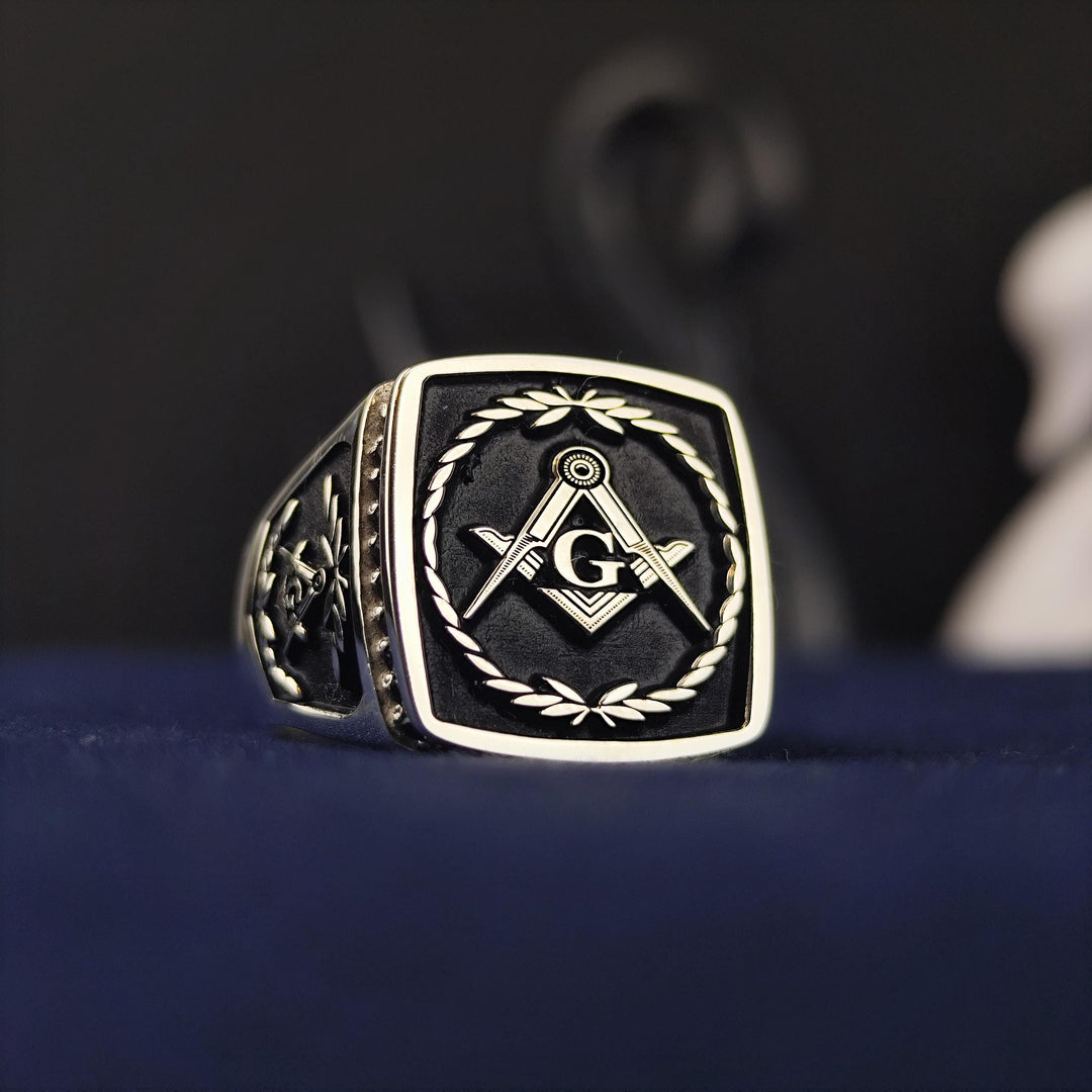 This stone-set Masonic lodge ring is a timeless symbol of Freemasonry, crafted in premium silver or gold. Featuring intricate detailing and a bold design, this Master Mason signet ring is ideal for those who cherish their fraternity and its rich history. Whether worn daily or for ceremonies, this elegant piece of Masonic jewelry serves as a proud emblem of dedication and enlightenment.