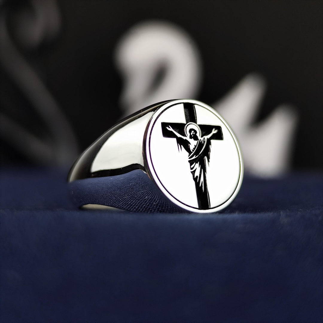 Express your devotion with this unisex handmade Jesus and cross ring, featuring a high-quality silver crucifix signet band. A perfect religious jewelry piece, it combines faith and fashion in a timeless design. Whether worn as a daily Christian symbol or given as a meaningful gift for Easter or Christmas, this ring represents spiritual strength and belief, making it a cherished addition to any jewelry collection.