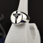 Load image into Gallery viewer, This handcrafted unisex cross and Jesus ring is a timeless expression of faith, made from high-quality silver. The crucifix signet band is designed to be a stylish yet meaningful piece of religious jewelry. Whether given as a Christian gift for Christmas or Easter, or worn daily as a symbol of devotion, this ring blends elegance with spirituality, making it an essential accessory for believers.