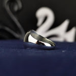 Load image into Gallery viewer, A classic unisex Jesus and cross ring, designed for those who want to carry their faith with them. This silver crucifix signet band is a stunning example of handmade Christian jewelry, perfect for both men and women. Whether worn as a daily reminder of belief or given as a Christian gift for Easter or Christmas, this ring serves as a lasting symbol of devotion and strength, blending beauty with spirituality.