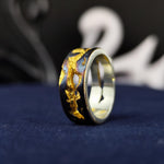 Load image into Gallery viewer, This unique rustic ring, crafted with an oxidized and gold-plated finish, embodies a raw and textured aesthetic. Handmade for those who appreciate vintage and antique jewelry, this statement band is perfect for daily wear or special occasions. The contrast between dark oxidation and warm gold highlights creates a striking visual effect, making it an elegant yet edgy accessory for men and women alike.