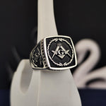 Load image into Gallery viewer, This stunning Masonic lodge ring features a bold stone set in an intricately designed signet band, symbolizing wisdom and fraternity. Handmade in silver or gold, this Master Mason ring is a perfect representation of tradition and heritage. Whether as a personal keepsake or a meaningful gift for a fellow Freemason, this detailed ring is an elegant tribute to the timeless values of Freemasonry.