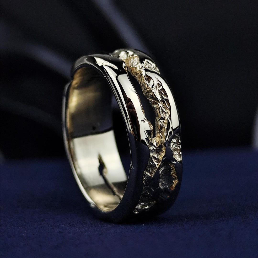 A beautifully imperfect 14K rustic gold ring featuring a raw-textured design that makes each piece unique. Whether worn as a simple wedding band or a minimal statement ring, this handmade solid gold piece is a meaningful addition to any jewelry collection. A timeless blend of rustic charm and elegant craftsmanship.